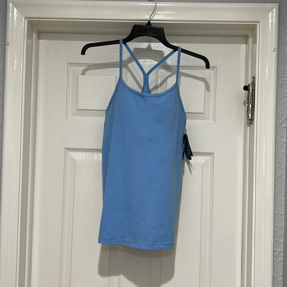 Light blue Nike exercise tank top with shelf bra. New with tags